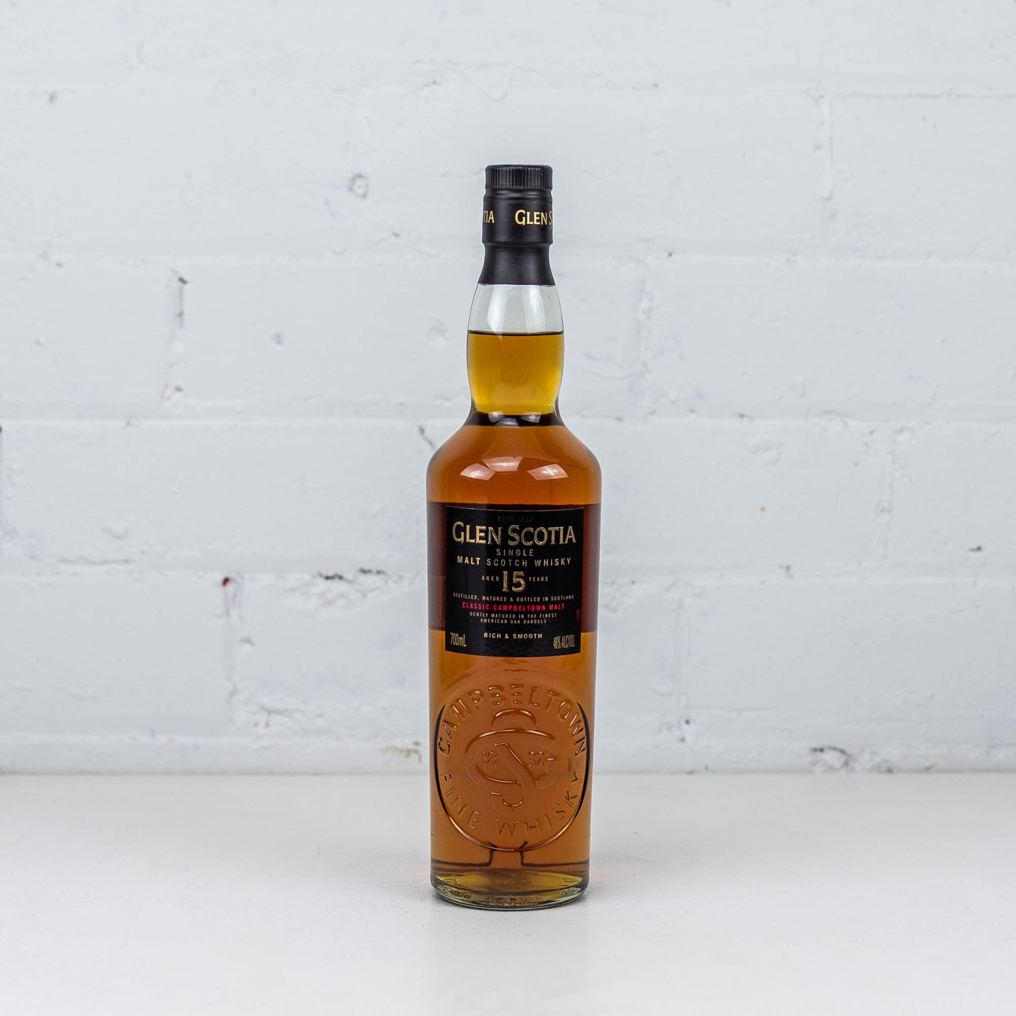 Bottle of Glen Scotia whisky on a white background